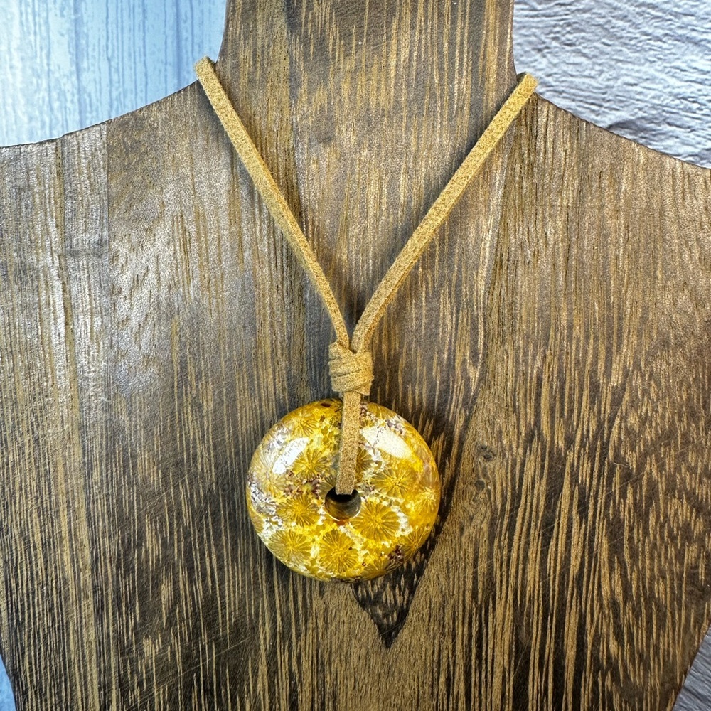 Yellow Coral Fossil Donut Pendant on Brown Faux Suede